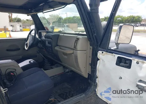 2003 Jeep Wrangler Sahara z USA, uszkodzony, nr VIN 1J4FA59SX3P307688